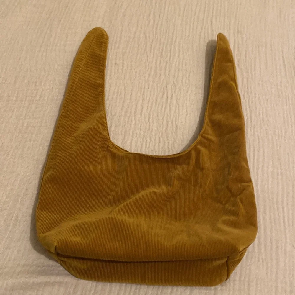MERIT Elegant Tan Knot Cosmetics Bag